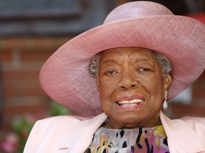 FILE - In this May 20, 2010 file photo, poet Maya Angelou smiles as she greets guests at a garden party at her home in Winston-Salem, N.C. How we address our elders and why set off a social media debate recently after a Los Angeles scriptwriter tweeted an old TV clip of Angelou rebuking a young woman for calling her by her first name.