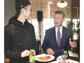 University of Windsor students had the chance to dine with the school's interim President Douglas Kneale during the annual Pizza with the Prez event on Wednesday, March 27, 2019. The event was part of Humanities Week activities. Student Donald Leung, left, chats with Kneale during the event.