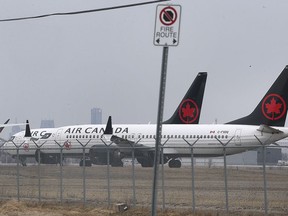 Grounded Air Canada Boeing 737 Max 8 planes are shown at the Windsor Airport in Windsor on Wednesday, March 20, 2019.