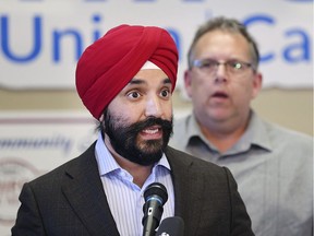 Navdeep Bains, federal Minister of Innovation, Science and Economic Development, speaks on March 29, 2019, at the Unifor Local 444 hall on Turner Road as Local 444 president Dave Cassidy looks on.