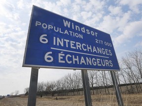 A population sign for the city of Windsor is shown on the 401 Highway near Walker Rd. on Thursday, March 28, 2019.