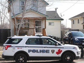 A Windsor police vehicle at 3142 Riberdy Rd. - the scene of a home invasion on March 19, 2019.