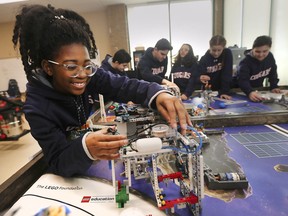 Alexa Kenneth-Ogah, a member of the Cougarbotics 6.0 team from Cardinal Carter Catholic Middle School in Leamington, works on a unit on Friday, March 1, 2019. The team is heading to an international competition in May.