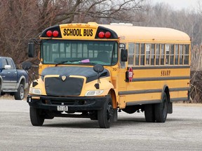 A school bus belonging to Sharp Bus Lines on a property in the 5500 block of Ojibway Parkway near the old Windsor Raceway on March 18, 2019.