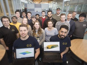 Michael Thamm, left, a 4th year electrical and computer engineering student at the University of Windsor, and Mohammed Alsalah, a 2nd year automotive product design student at St. Clair College, are joined by the rest of mix university and college students taking part in SpaceC's Hyperloop Pod Competition, pictured in the Ed Lumley Centre for Engineering Innovation on March 13, 2019.