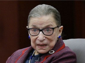 FILE - In this Jan. 30, 2018 file photo, Supreme Court Justice Ruth Bader Ginsburg answers a law student's question as she participates in a "fireside chat" in the Bruce M. Selya Appellate Courtroom at the Roger William University Law School in Bristol, R.I.