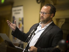 Flavio Volpe, president of the Automotive Parts Manufacturers' Association, speaks at a manufacturing forum discussing the impact U.S. tariffs will have on the auto and manufacturing industry, Wednesday, July 18, 2018. Volpe is concerned about the impact of a shutdown of the U.S.-Mexico border would have on the auto industry.