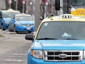 A group of taxi vehicles in downtown Windsor are shown in this March 2017 file photo.