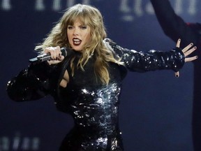 In this May 8, 2018, file photo, Taylor Swift performs during her "Reputation Stadium Tour" opener in Glendale, Ariz.