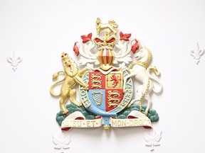 The Royal Coat of Arms from behind the judges' bench in a courtroom at the Superior Court of Justice in Windsor in April 2016.