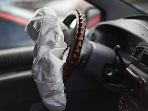 A deployed airbag is seen in a Chrysler vehicle at the LKQ Pick Your Part salvage yard on May 22, 2015 in Medley, Florida.