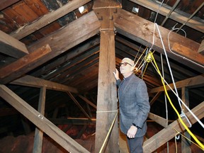 "Good for 100 years." Father Maurice Restivo offered the Windsor Star a rare glimpse inside the attic of the 174-year-old Our Lady of the Assumption Church on April 5, 2019. Massive timbers support the roof which is slated to receive new copper cladding starting next month.