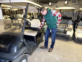 Fleet renewal? Roseland Golf and Curling Club acting general manager Michael Chantler inspects golf carts which are showing signs of wear and tear on April 12, 2019. Council will be asked Monday for help to replace the entire fleet.