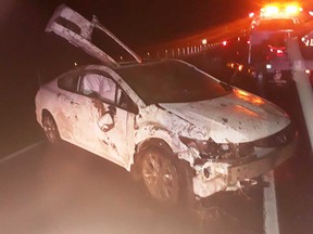 The wreckage of a car that crashed on Highway 401 between Essex County and Chatham-Kent on April 11, 2019. OPP said the vehicle reached speeds of 195 km/h before rolling.
