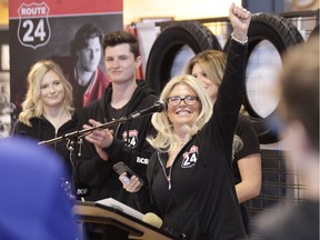 In this file photo, widow Dani Probert pumps her fist in the air to celebrate the Bob Probert Ride raising $1 million in eight years on Wednesday, April 24, 2019, at Thunder Road Harley-Davidson.