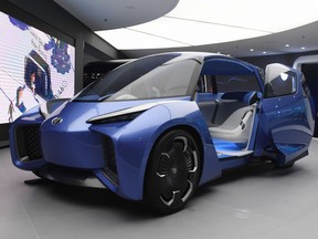 This photo taken on April 17, 2019 shows a Toyota Rhombus autonomous vehicle concept at the Shanghai Auto Show in Shanghai. - Global automakers are positioning for a brave new world of on-demand transport that will require a car of the future -- hyper-connected, autonomous, and shared -- and China may become the concept's laboratory.