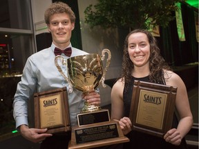 At left, Tyler Jones, 20, of the St. Clair cross-country team and Jana Kucera, 20, from the St. Clair women's basketball team, were awarded male and female Al Hoffman athlete of the year for outstanding achievement at Wednesday's St. Clair College Saints Athletic Awards Banquet at the St. Clair Centre for the Art.