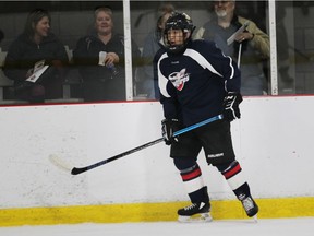 Defenceman Aydin Parekh waits for the puck by the boards at the Windsor Spitfires mini-camp on Saturday at the WFCU Centre.