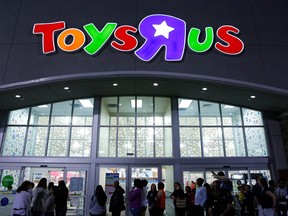 Shoppers wait in line to take advantage of Black Friday specials at the Toys"R"Us on North Central Expressway in Dallas on Thursday Nov. 22, 2012.