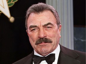 FILE - In this Nov. 16, 2017, file photo, Tom Selleck  is shown during Oklahoma Hall of Fame induction ceremonies in Oklahoma City. Selleck is working on a memoir, and it won't just be about acting. The "Magnum P.I." star has a deal with Dey Street Books, an imprint of HarperCollins Publishers. The book, announced Monday, April 8, 2019, is currently untitled and does not yet have a release date. Selleck, 74, said in a statement that he would share stories about his career, but also about life "away from the camera."