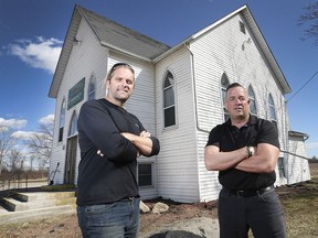 Drew Coulson, left, and Greg Grondin have purchased the former Malden Methodist Church at the end of Howard Ave. in Amherstburg and plan to convert it into a bed and breakfast business. They are shown at the landmark building on Tuesday, April 9, 2019.