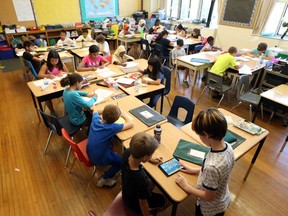 A Grade 5-6 split class is seen at Marlborough elementary school in this 2017 file photo. The fourth wave of COVID-19 is beginning in parts of Canada and "we expect cases to be concentrated largely in younger, unvaccinated people," says Dr. Theresa Tam, Canada's chief public health officer.