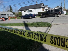 Police tape surrounds a crime scene at 1496 Lillian Ave. in Windsor on April 22, 2019.