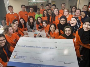 Dave Penner's leadership class from Vincent Massey Secondary School donates a cheque for $16,525 to the Ronald McDonald House at Windsor Regional Hospital - Met Campus,  Tuesday, April 23, 2019.  The class held a one-day fundraiser at the school by holding basketball games students could by tickets to.