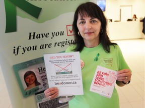 Niva Segatto, Windsor Essex Gift of Life Association chairwoman, holds signs at Devonshire Mall in Windsor encouraging people to sign up as  organ and tissue donors on Sunday, April 28, 2019.