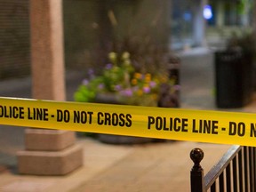 Police tape in the 500 block of Ouellette Avenue in downtown Windsor in October 2018.