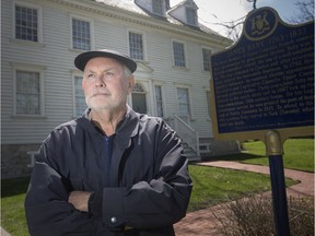 Don Wilson, president of Les Amis Duff-Baby, is pictured outside the Duff-Baby House, Monday, April 22, 2019.