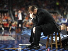 Michigan State head coach Tom Izzo reacts on the bench during the first half against Texas Tech in the semifinals of the Final Four NCAA college basketball tournament, Saturday, April 6, 2019, in Minneapolis.