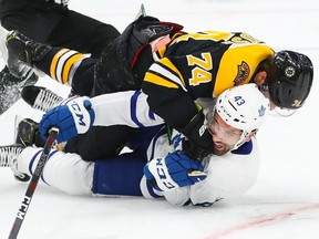 Boston forward Jake DeBrusk and Maple Leafs centre Nazem Kadri. AP PHOTO