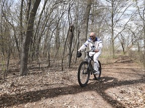 Dion Roberts rides his bike on a dirt trail at the Malden Park in Windsor on Wednesday, April 24, 2019.