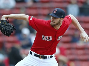 Boston Red Sox's Chris Sale pitches during the first inning of the first game of a baseball doubleheader against the Detroit Tigers in Boston, Tuesday, April 23, 2019.