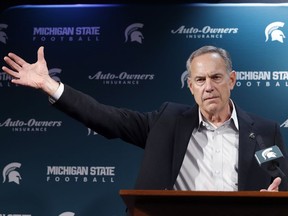 FILE - In this Jan. 10, 2019, file photo, Michigan State coach Mark Dantonio addresses the media during an NCAA college football news conference, in East Lansing, Mich. Michigan State's offense clearly needed a boost after last season, but instead of looking externally for help, coach Dantonio simply reshuffled his existing assistants. Brad Salem is now the offensive coordinator, and Dantonio's whole staff will be under scrutiny this year.