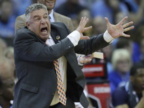 Auburn head coach Bruce Pearl yells from the sidelines during the first half of a men's NCAA tournament college basketball Midwest Regional semifinal game against North Carolina Friday, March 29, 2019, in Kansas City, Mo.