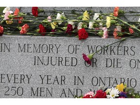 Flowers are shown at a memorial site at Coventry Gardens during a National Day of Mourning ceremony for workers killed or injured in the workplace. This year's ceremony will be held Sunday, April 28.