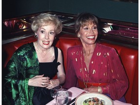 FILE - In this Aug. 30, 1992, file photo, Mary Tyler Moore, right, is joined by former "Mary Tyler Moore Show" co-star Georgia Engel, left, who played Georgette, at New York's Russian Tea Room, as the two reunited during an Emmy Awards screening party Moore hosted at the famous New York restaurant. Engel died Friday, April 12, 2019, in Princeton, N.J., at age 70.
