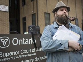 Andrew Nellis, organizer of the Street Labourers of Windsor, is pictured outside Superior Court, Tuesday, April 30, 2019, where he filing to prevent a recent eviction notice.