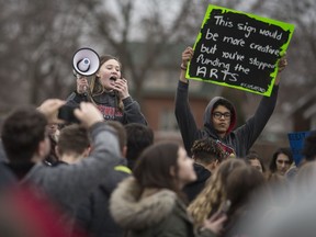 Mira Gillis, 16, a Grade 11 student at F.J. Brennan Catholic High School, expresses her views to hundreds of students in a walkout on April 4, 2019, to protest cuts to education by the Ontario government.