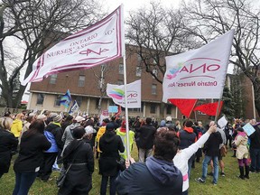 Striking members of Ontario Nurses' Association Local 8 and supporting unions rally across the street from the Windsor-Essex County Health Unit on April 12, 2019.