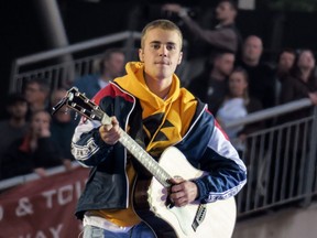 Justin Bieber performs at Ariana Grande show One Love Manchester at Old Trafford Cricket Ground in a concert to benefit the victims of the terror attack June 4, 2017 Credit: WENN.com