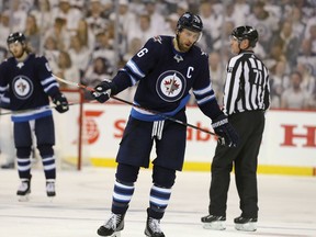 Winnipeg Jets captain Blake Wheeler (26) skates back to his bench after a goal by the St. Louis Blues in Game Two of the Western Conference First Round during the 2019 NHL Stanley Cup Playoffs at Bell MTS Place on Friday.