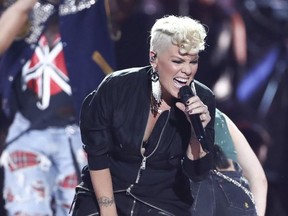 In this Sept. 22, 2017, file photo, Pink performs at the 2017 iHeartRadio Music Festival Day 1 held at T-Mobile Arena in Las Vegas.