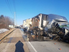 The wreckage of a tractor trailer that struck a second tractor trailer on County Road 18 near Kingsville on the morning of April 1, 2019.