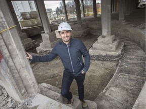 Piero Aleo, owner of the Walker Power Building in Olde Walkerville, stands next to an 1880's locomotive turntable unearthed during renovations to the building, Wednesday, April 10, 2019.  The turntable, estimated to be constructed circa 1880, is located in north-west corner of the building, which was built approximately 30 years later.