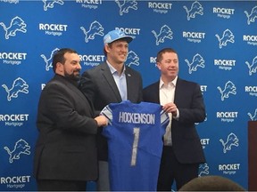 Detroit Lions first-round pick T.J. Hockenson (centre) is introduced to the media on Friday by head coach Matt Patricia (left) and general manager Bob Quinn (right) at the team's practice facility in Allen Park, MIch.