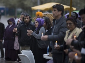 Approximately 50 people gathered at Charles Clark Square, Thursday, April 25, 2019, to hold a candlelight vigil in honour of those killed in the Easter Sunday bombings in Sri Lanka.