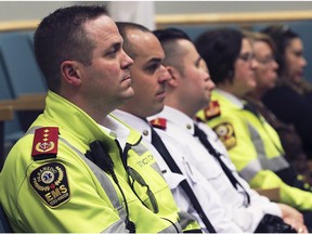 Essex Windsor EMS District Chief Tyson Brohman, left, Deputy Chief Justin Lammers and other paramedics are shown during a press conference on Tuesday, April 2, 2019, at the Essex County Civic Centre regarding the partnering of Wounded Warriors Canada with local first responders.